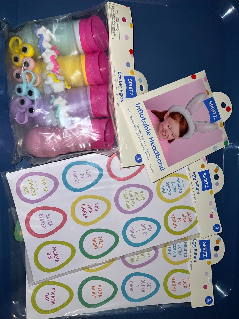 NWT 85pc Plastic eggs with unicorn eraser’s & squishy reward cards headband